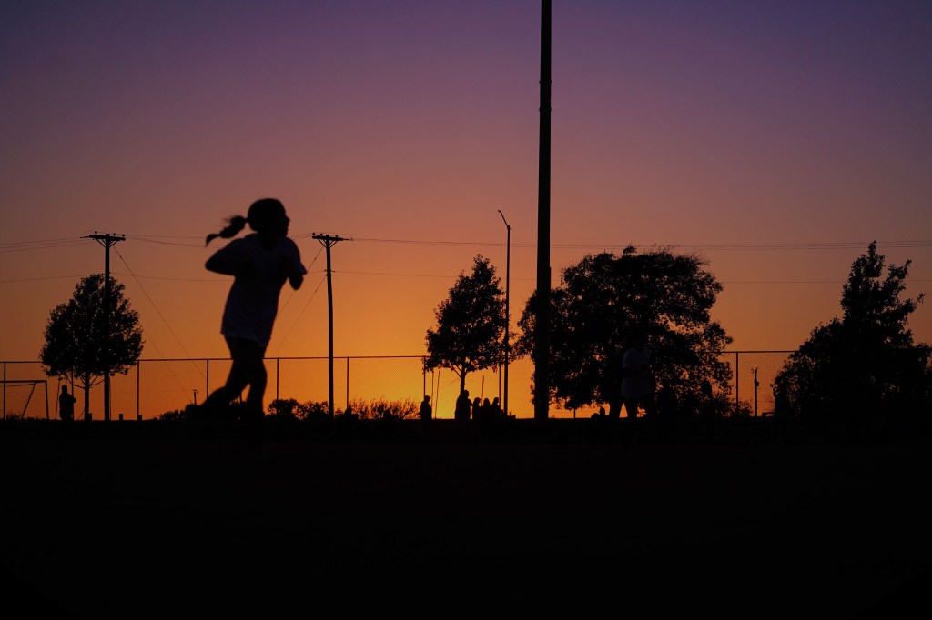 Soccer Game with sunset